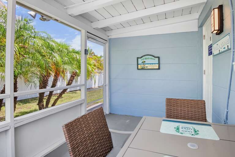 Relax and enjoy outdoor dining in the screened patio.