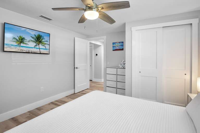 Relaxing primary bedroom retreat with king bed.
