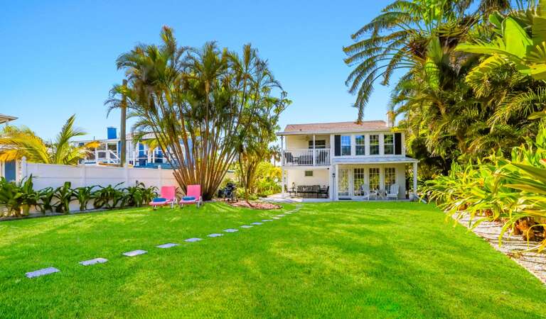Backyard lawn with outdoor seating