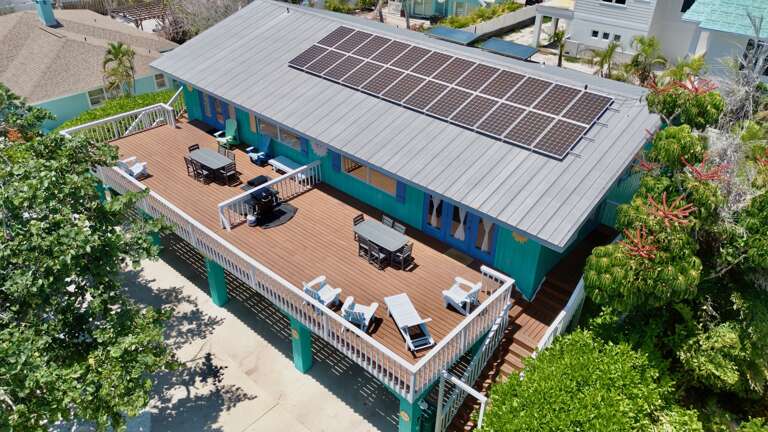 Drone view of house and pool