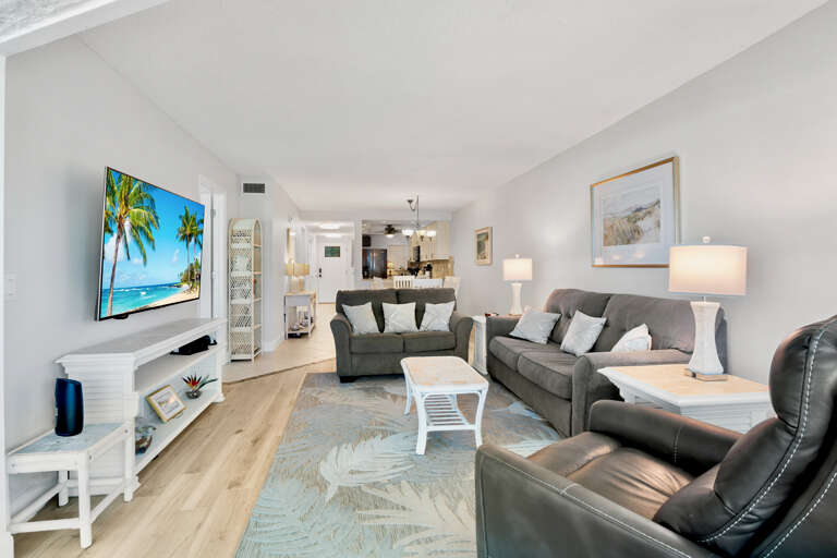 Living area with plush seating and TV