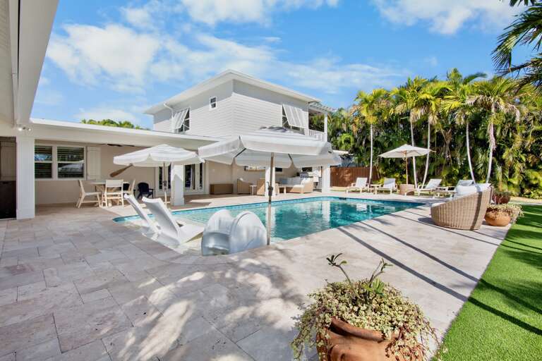Private heated pool and outdoor lounge chairs