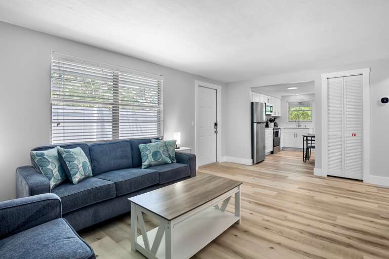 Open living space with comfortable seating and easy access to the kitchen.