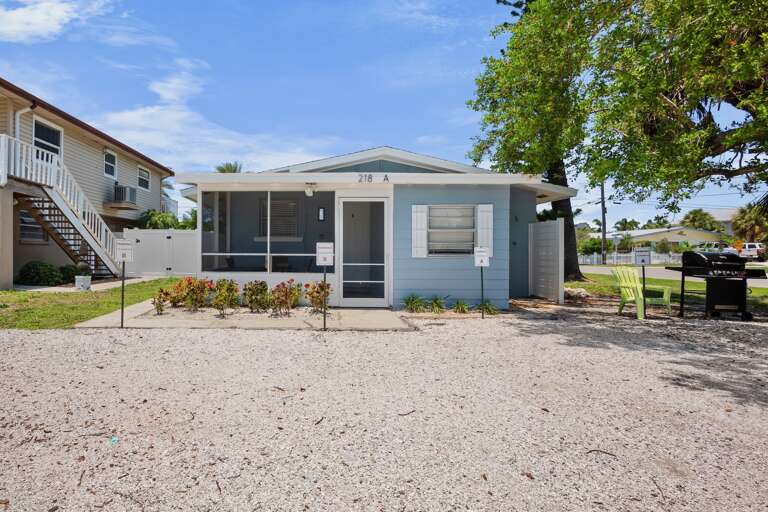 Exterior view of the property with convenient on-site parking.