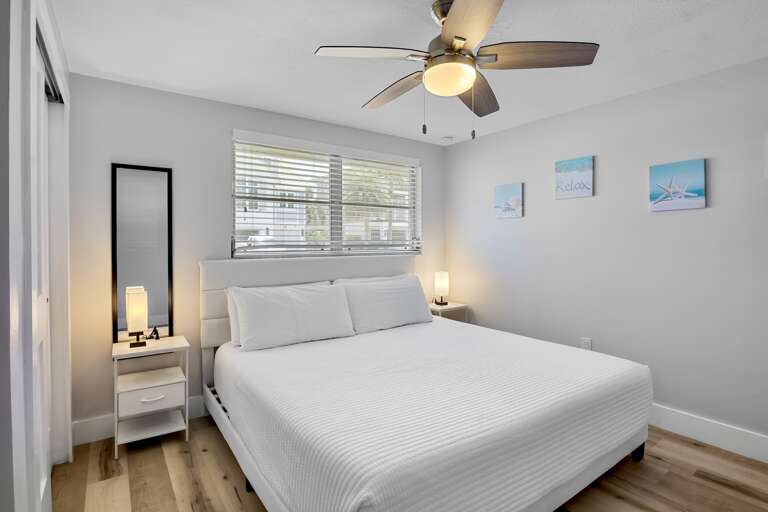 Relaxing primary bedroom retreat with king bed.