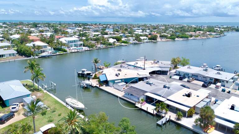 Waterfront home with Patio with Canal Views