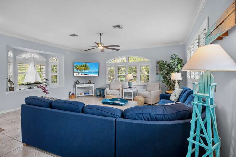 Living area with plush seating and TV