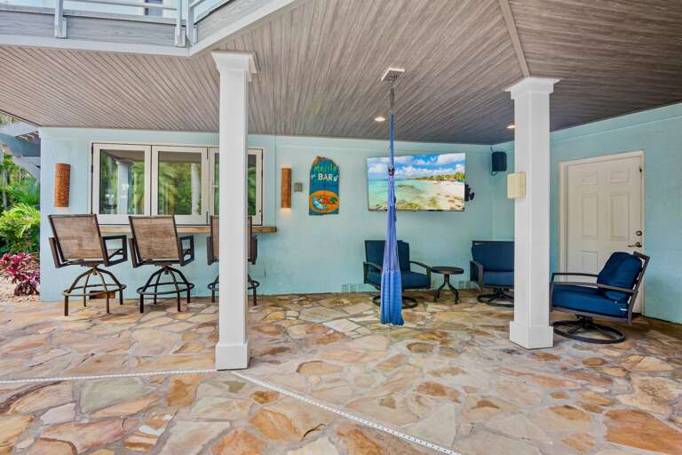 Outdoor Lounge Area with TV