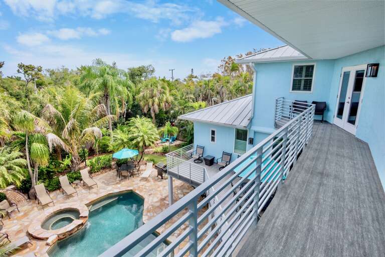 Balcony overlooking the pool and putting green