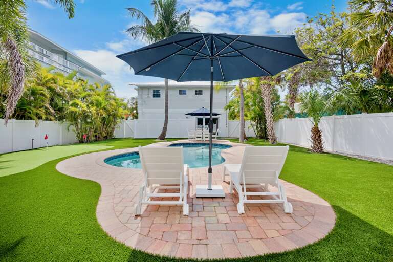 Backyard Entertainment Area with Pool & Dining