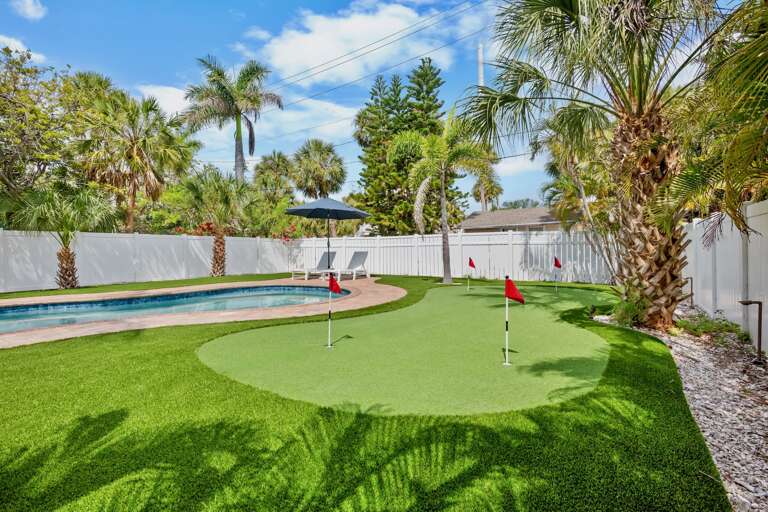 Backyard with Pool, Putting Green & Outdoor Dining
