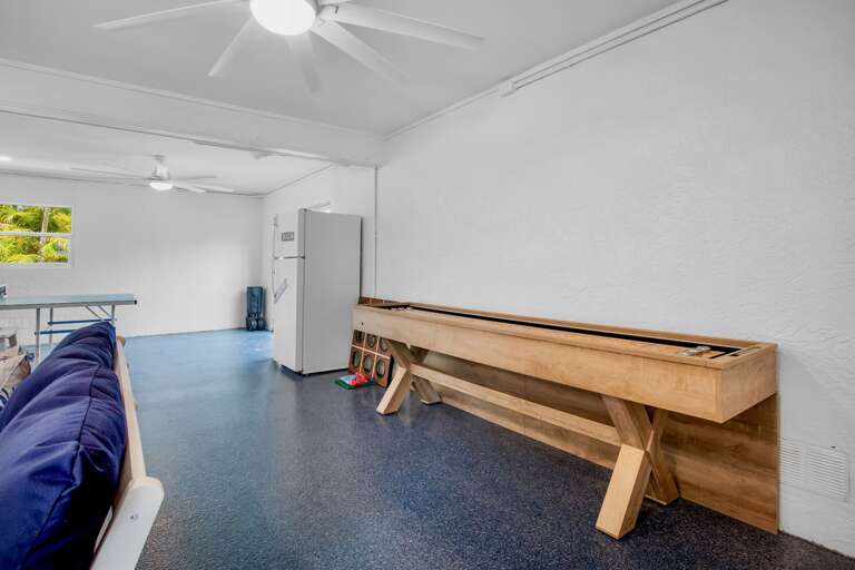 Game Room with Shuffleboard Table