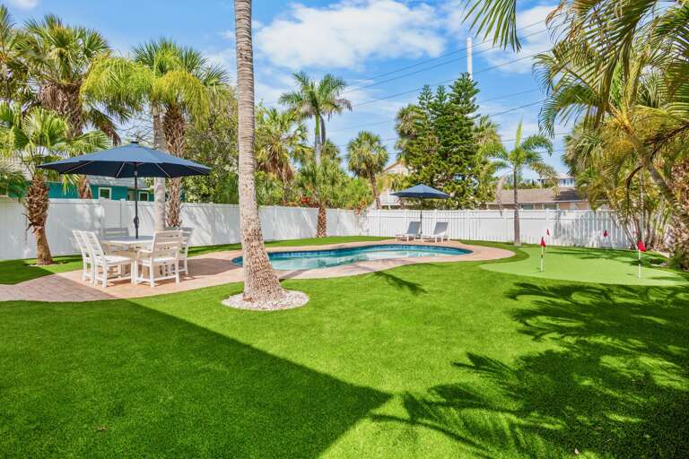 Backyard with Pool, Putting Green & Outdoor Dining