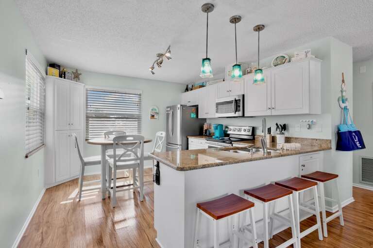 Open Kitchen with Island and Dining Table