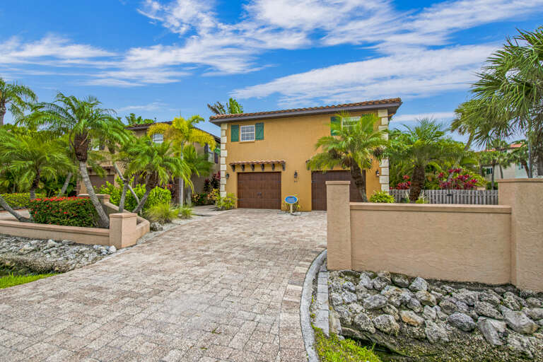 Exterior of Calypso Cottage by Anna Maria Vacations