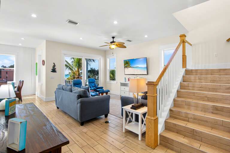 Living area with plush seating and TV