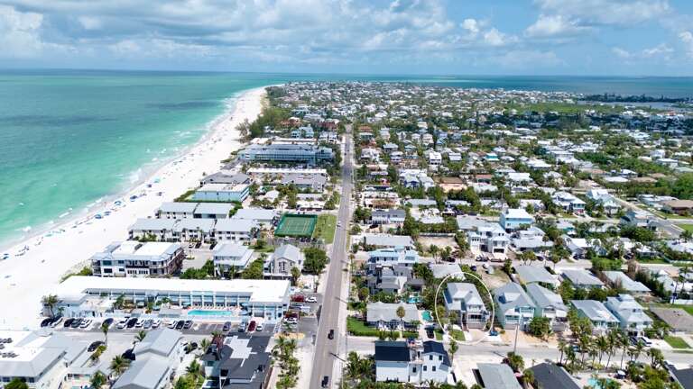 Drone shot of home near the coast