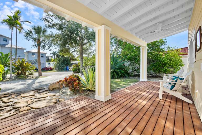 Private covered deck with tropical garden views
