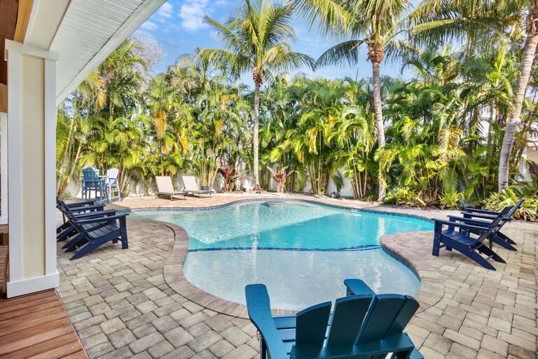 Tropical oasis with Adirondack chairs