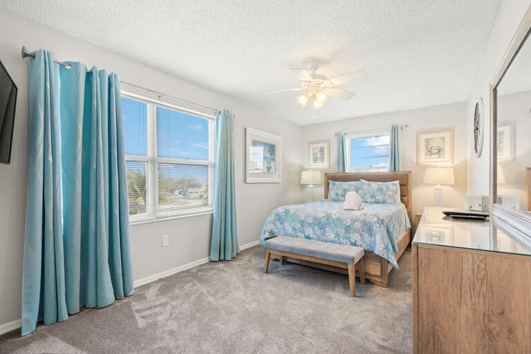 Primary Bedroom - Queen Bed and Ensuite Bathroom