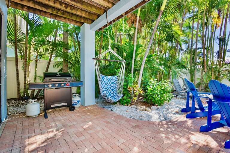 Outdoor BBQ grill and relaxing swing chair