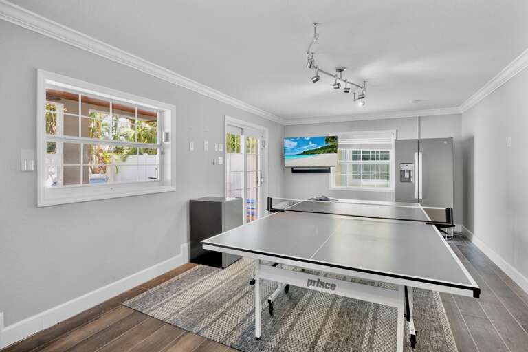 Game Room with Ping Pong, TV, and Refrigerator