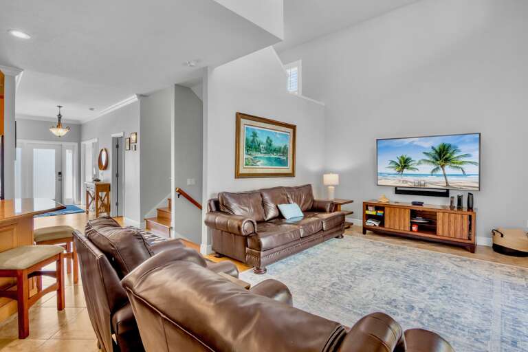 Living area with plush seating and TV