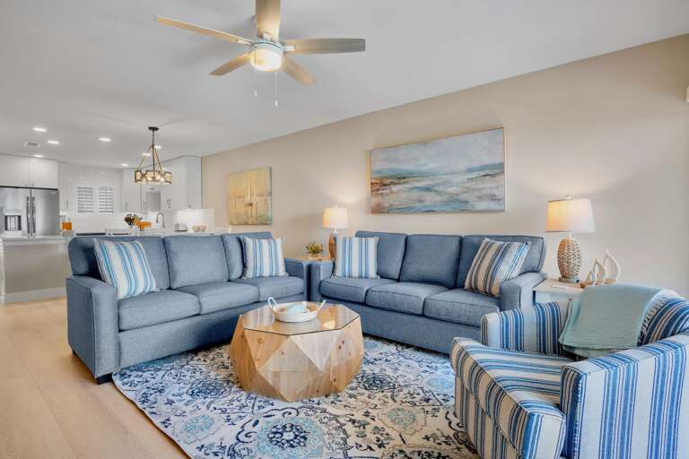 Living area with coastal blue sectional seating