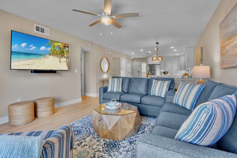 Living area with plush seating and TV