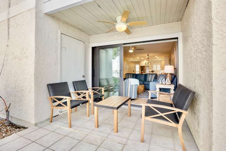 Private covered patio with outdoor seating