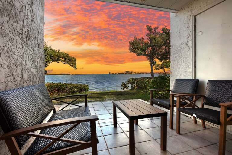 Private covered patio with outdoor seating