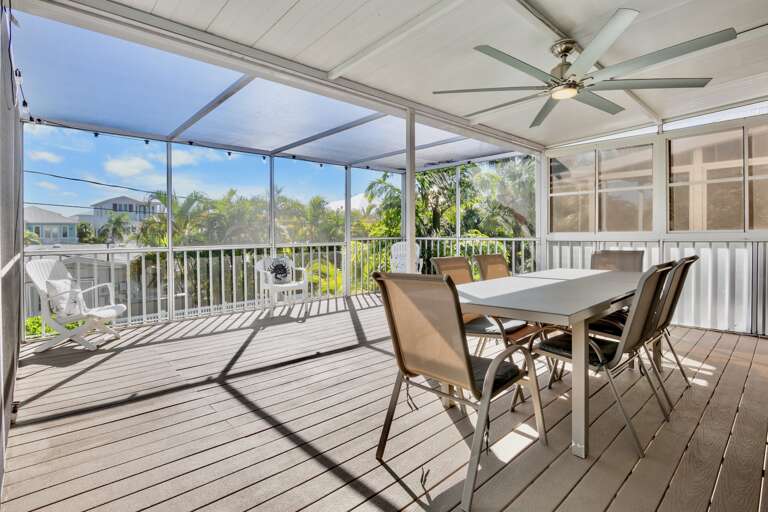 Screened outdoor dining space