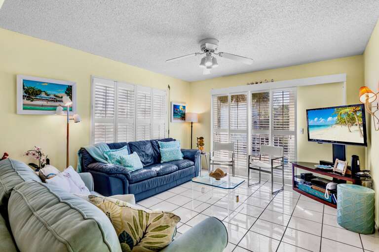 Living Room with Plush Seating and TV