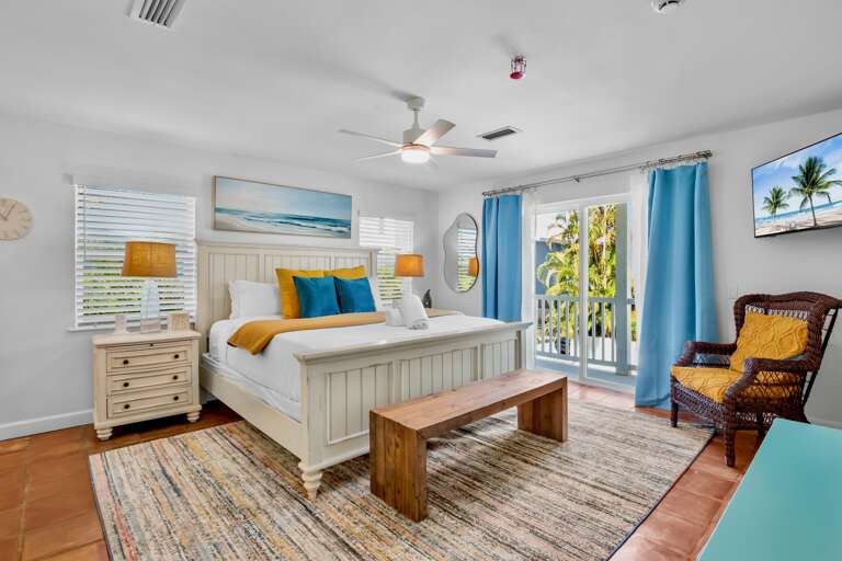 Primary Bedroom, King bed, workspace, and balcony