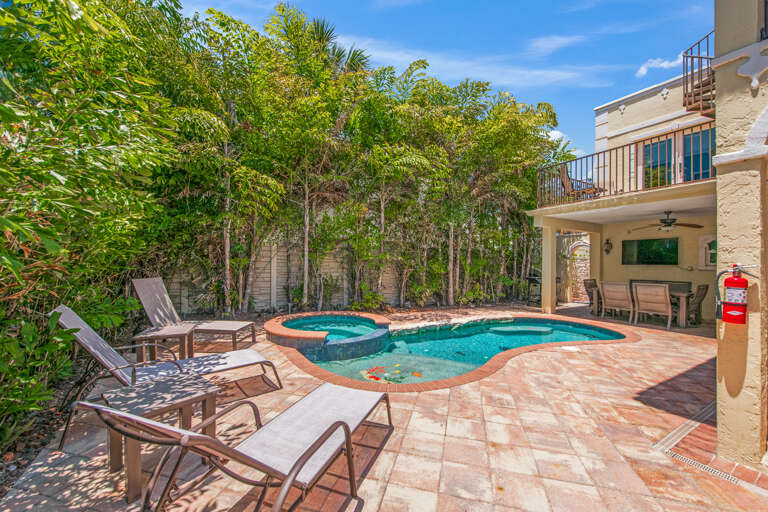 Pool area with relaxing loungers