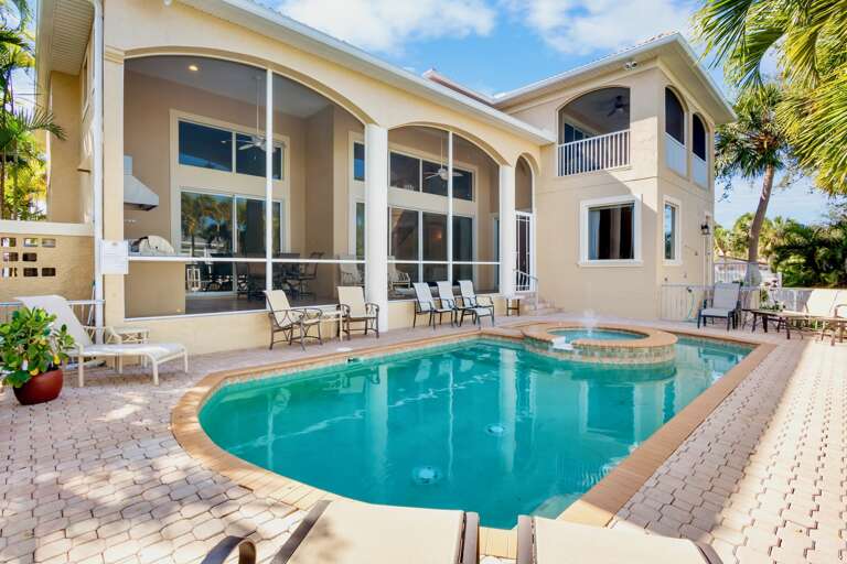 Private heated pool with spacious covered patio