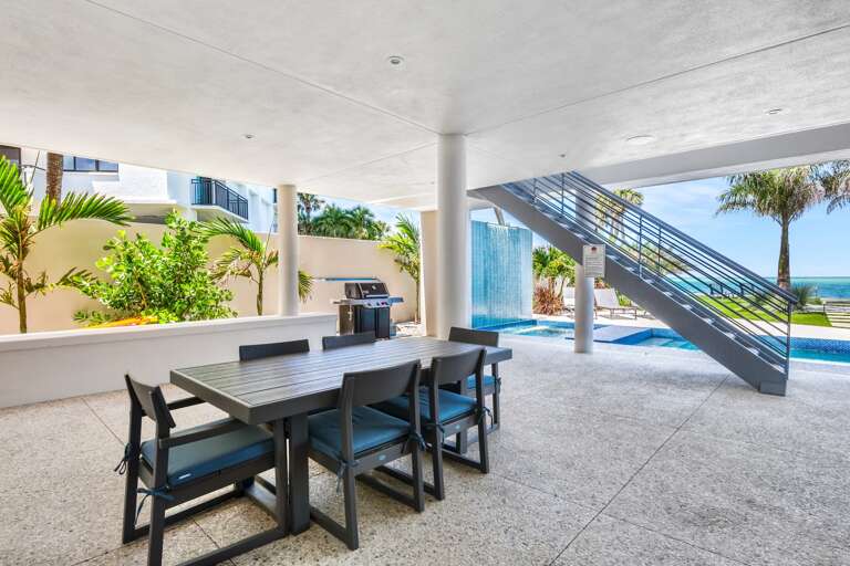 Dine Poolside with an Outdoor Grill and Gulf views