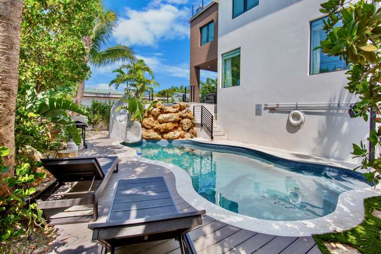 Poolside Water Slide, Loungers and BBQ