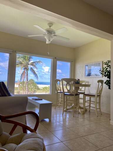 Screened lanai with comfortable seating