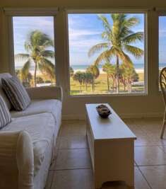 Screened lanai with comfortable seating