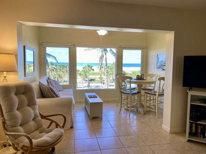Screened lanai with comfortable seating