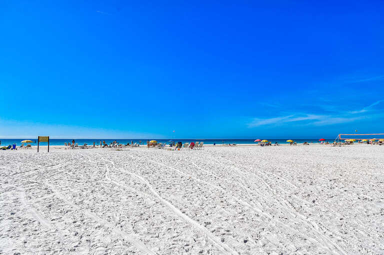 Beautiful sandy beach steps away