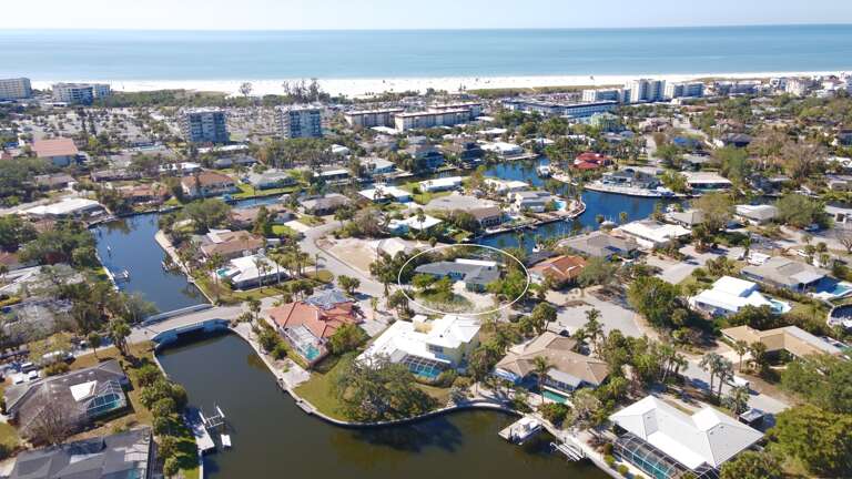 Aerial view of the home on the canal