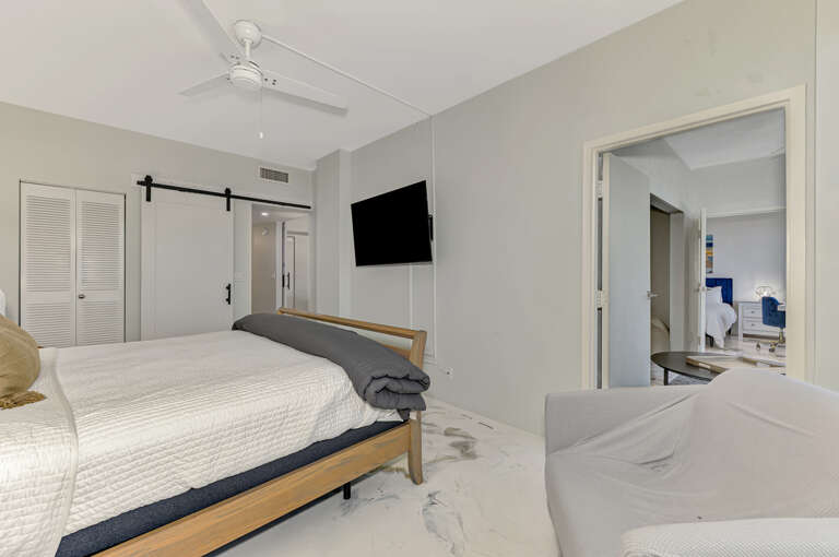 Unwind in your serene bedroom sanctuary with calming neutral tones, modern amenities, and thoughtful touches for ultimate relaxation.