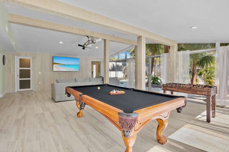 Challenge friends to pool or foosball