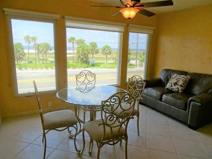 Screened lanai with comfortable seating