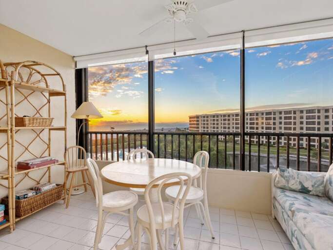 Savor your morning coffee on this sunny balcony while watching spectacular sunrises paint the sky golden over the cityscape.