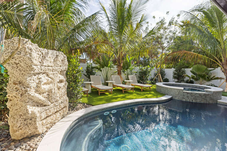 Private poolside loungers for sunbathing