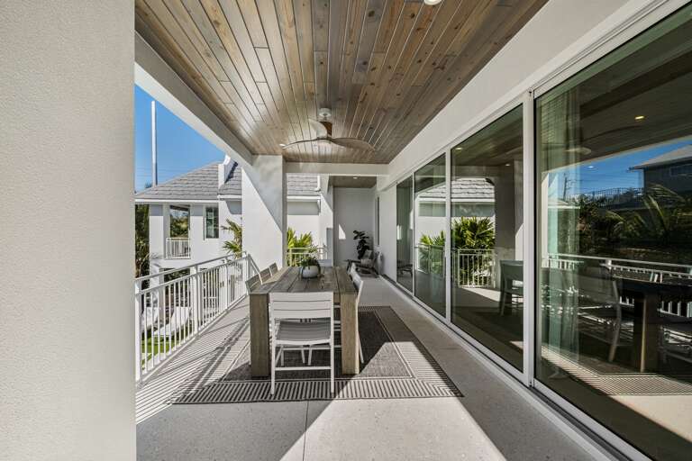 Private covered balcony with dining space