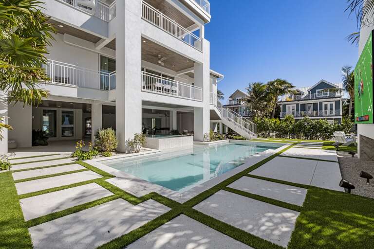 Private pool surrounded by tropical landscaping